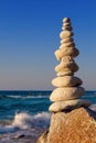 Concept of harmony and balance. Rock Zen at sunset. Royalty Free Stock Photo