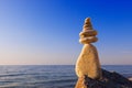 Concept of harmony and balance. Rock Zen at sunset. Royalty Free Stock Photo