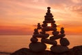 Concept of harmony and balance. Rock Zen at sunset. Royalty Free Stock Photo
