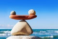 Concept of harmony and balance. Balance stones against the sea. Royalty Free Stock Photo