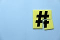 Concept of hashtag, viral post through web network,social media or blog. Tag for marketing and trend. Icon of hashtag on a yellow Royalty Free Stock Photo