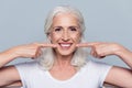 Concept of having strong healthy straight white teeth at old age Royalty Free Stock Photo