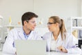 concept of health care researchers, researchers working in biological science laboratories, young research scientists and male Royalty Free Stock Photo