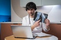 The concept of healthcare, medicine and people - a happy smiling male doctor with an X-ray scan of the spine conducts a Royalty Free Stock Photo