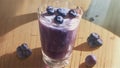 Healthy Cold Blueberry Drink In Glass With Fresh Berries And Ice. Generative AI