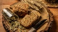 The concept of healthy eating. Whole grain bread with seeds of goji berry, pumpkin, on a plate on a wooden background Royalty Free Stock Photo