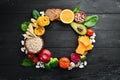 Concept of healthy food: bread, pasta, avocado, flour, pumpkin, broccoli, beans, spinach. Vegetables and fruits. Royalty Free Stock Photo