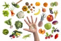 Concept of healthy food, Various Fruits and vegetables to eat five a day written in a hand in the middle on withte