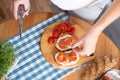 Pregnant young woman preparing healthy sandwiches with microgreens and vegetables. View from above Royalty Free Stock Photo