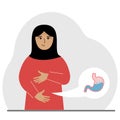 The concept of a healthy stomach. The arab woman holds her stomach with both hands. A healthy stomach or proper