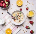 The concept of a healthy and wholesome breakfast, cereal with nuts and fruit place for text,frame wooden rustic background top