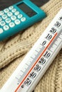 Concept of heating season with thermometer, close up Royalty Free Stock Photo