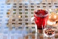 Concept of herbal tea. Hibiscus tea in a glass mug with turkish