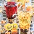 Concept of herbal tea. Variety of herbal teas in glass mugs. Healthy caffein-free drinks. Chamomile, hibiscus and linden teas wit Royalty Free Stock Photo