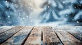 The concept is for a holiday, Christmas day and new year idea with an empty wood table top and a snowfall background. Royalty Free Stock Photo