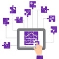 The concept of home remodeling. The house in the form of a puzzle and icons repair tools in purple. Hand collecting puzzle home on Royalty Free Stock Photo