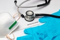 Layoff notice, medical equipment, gloves and stethoscope