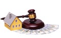 Concept of house sale with gavel and money Royalty Free Stock Photo