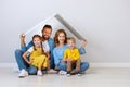 Concept housing a young family. mother father and children in  new home Royalty Free Stock Photo