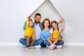 Concept housing a young family. mother father and children in  new home Royalty Free Stock Photo