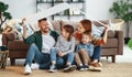 Concept housing a young family. mother father and children in  new home Royalty Free Stock Photo