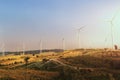 concept idea eco power energy. wind turbine on hill Royalty Free Stock Photo