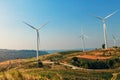 concept idea eco power energy. wind turbine on hill Royalty Free Stock Photo