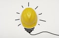 Concept idea with safety helmet light bulb isolate on white background Royalty Free Stock Photo