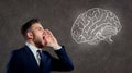 A man screams at the brain. Royalty Free Stock Photo