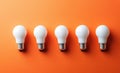 A concept is illustrated by a string of light bulbs, one glowing to represent an idea Royalty Free Stock Photo