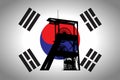 Concept Illustration With Korean Flag in the Background And Coal Mine Ferris Wheel SIlhouette in the foreground