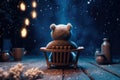 A tiny bear sitting on a wooden chair by the fire with a cup of hot chocolate, starry night, magic snow background. Generative AI Royalty Free Stock Photo