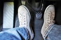 An concept image of a car pedal with jeans and foodware Royalty Free Stock Photo