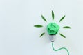 Concept image if green crumpled paper lightbulb, symbol of scr, innovation and eco friendly business