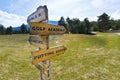 Concept image of a signpost with golf course Royalty Free Stock Photo