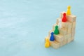 concept image of wood blocks stacking as chart or ladder. concept for growth and success. Royalty Free Stock Photo