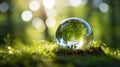 Concept image of a young seedling growing inside a protective clear spherical orb showing biodiversity on earth