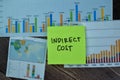 Concept of Indirect Cost write on sticky notes isolated on Wooden Table Royalty Free Stock Photo