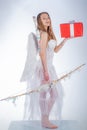 Concept of innocent girl. Love card. Postcard for Valentines Day - copy space. Valentines day. Cupid cute girl with a