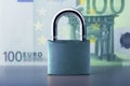 Padlock against Euro Bank Note. Financial concept.