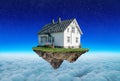 Concept insurance, the house on the island levitates Royalty Free Stock Photo