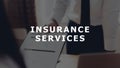 Concept Insurance services message on background business man in the office fill out insurance policy.