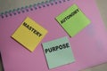 Concept of 3 internal motives. Mastery, autonomy, purpose write on sticky notes isolated on Wooden Table Royalty Free Stock Photo