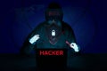 Concept Internet crime and cyber security . Hacker working on a code on blue background Royalty Free Stock Photo