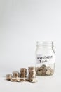 Concept of investing money for retirement and growing value over time, piles of silver coins compounding and growing next to a jar