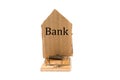 The concept of investment Banks. Mousetrap with a cardboard house, with the inscription Bank. Isolated. Copy space