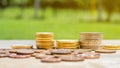 Concept of investment and saving money. Pile of euro coins on wooden table Royalty Free Stock Photo