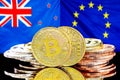 Bitcoins on New Zealand and European Union flag background