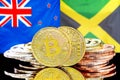Bitcoins on New Zealand and Jamaica flag background