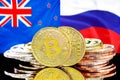 Bitcoins on New Zealand and Russia flag background